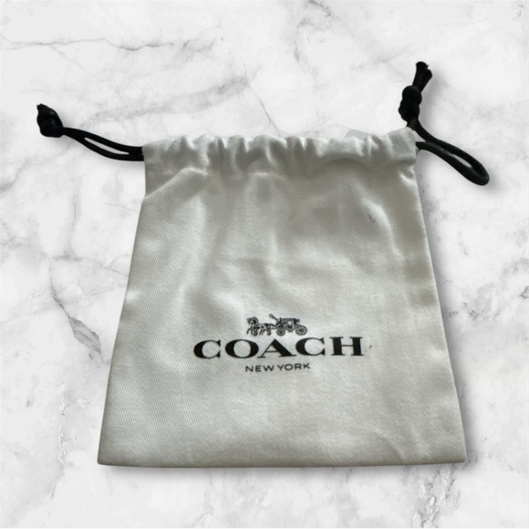 Coach Signature Openwork Hoop Earrings
Silver Tone - Picture 5 of 5